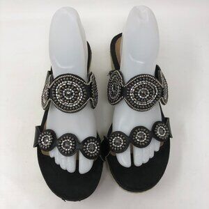 Sole Sensibility Gwendolyn Medallion Sandals Black